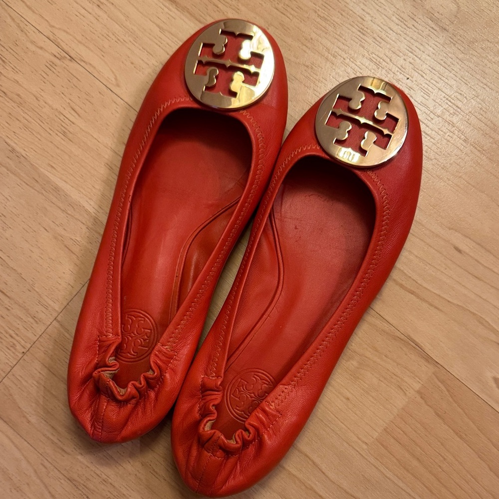 Tory Burch Orange Ballet Flats with Gold Emblem